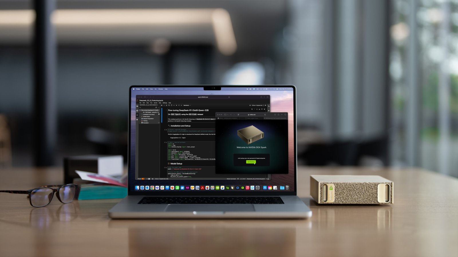 A estação DGX Spark está localizada ao lado do MacBook Pro. 